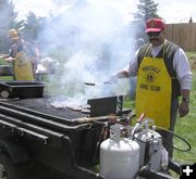 Lions Club cooked burgers. Photo by Pinedale Online.
