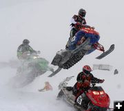 High flying snowmobiles. Photo by Clint Gilchrist, Pinedale Online.