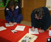 Signing In. Photo by Pam McCulloch, Pinedale Online.