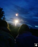Watching Fireworks. Photo by Pam McCulloch, Pinedale Online.