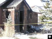 Burned home. Photo by Bob Rule, KPIN 101.1 FM Radio.