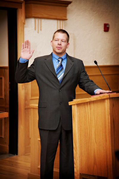 Neal Stelting takes his oath. Photo by Tara Bolgiano.