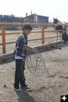 Learning to hold the rope. Photo by Dawn Ballou, Pinedale Online.