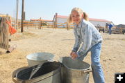 Rinsing laundry. Photo by Dawn Ballou, Pinedale Online.