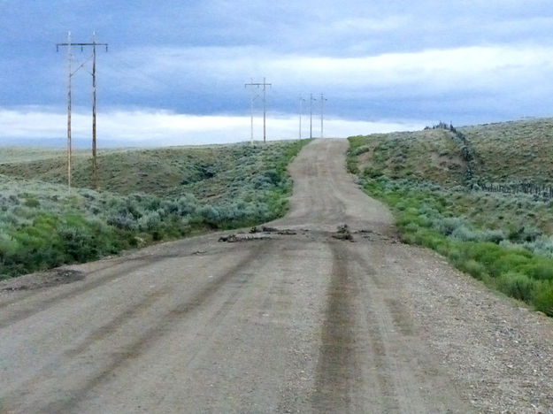 Overtopped road. Photo by Dawn Ballou, Pinedale Online.