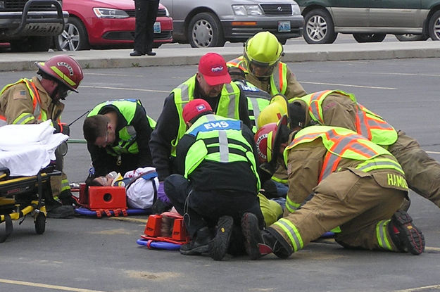 Working on victims. Photo by Bob Rule, KPIN 101.1FM Radio.