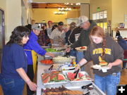 Feeding the Volunteers. Photo by Terry Allen.