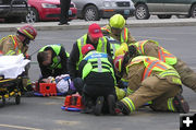 Working on victims. Photo by Bob Rule, KPIN 101.1FM Radio.