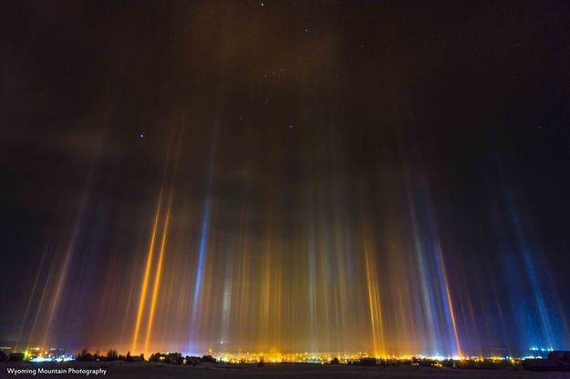 Light pillars around midnight. Photo by Dave Bell.
