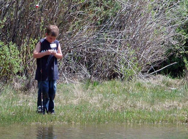 Baiting the Hook. Photo by Pinedale Online.