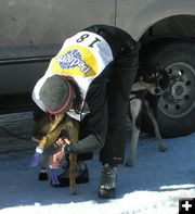 Putting boots on. Photo by Dawn Ballou, Pinedale Online.