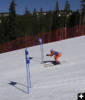 Colorful Orange Skier. Photo by Pinedale Online.