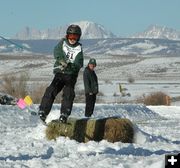 Makes the Jump. Photo by Clint Gilchrist, Pinedale Online.