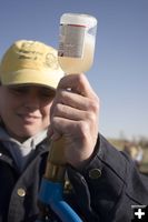 Kat Wolaver gets ready to vaccinate . Photo by Tara Bolgiano.