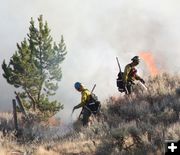 Putting in the black line. Photo by Clint Gilchrist, Pinedale Online.