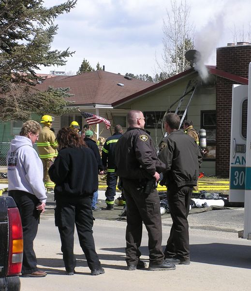 Watching the fire. Photo by Dawn Ballou, Pinedale Online.