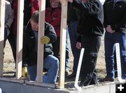 Governor pounds in nail. Photo by Dawn Ballou, Pinedale Online.