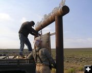 Installing the new sign. Photo by Sublette County Museum Board.