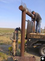 Hanging the sign. Photo by Sublette County Museum Board.