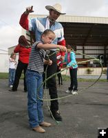 Showing how to twirl. Photo by Dawn Ballou, Pinedale Online.