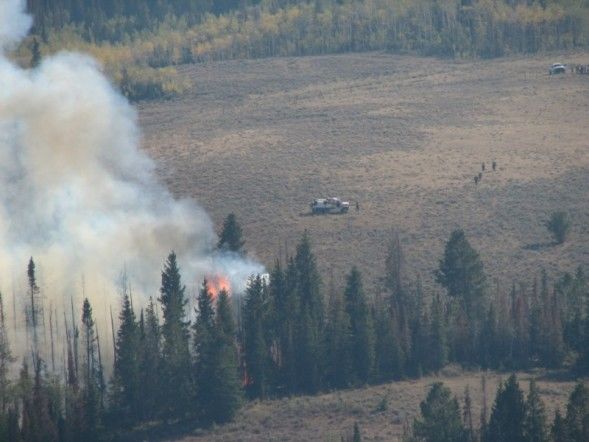 Firefighter crews move in. Photo by Kenna Tanner.