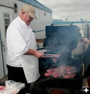 Rollie cooking steaks. Photo by Dawn Ballou, Pinedale Online.