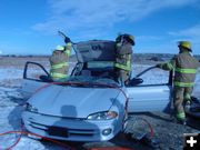 Taking off the roof. Photo by Sublette County Fire Board.