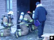 Keeping low at the door. Photo by Sublette County Fire Board.