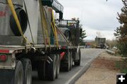 Truck traffic on road. Photo by Dawn Ballou, Pinedale Online.