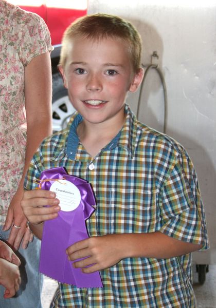 Thomas and his ribbon. Photo by Dawn Ballou, Pinedale Online.