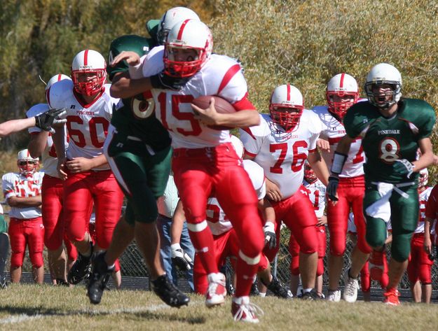 Caught in the backfield. Photo by Clint Gilchrist, Pinedale Online.