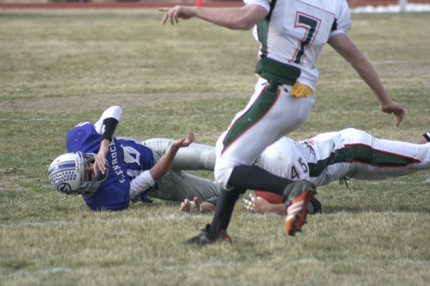 Fumble!. Photo by Jonathan Van Dyke, Pinedale Roundup.