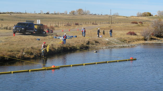 Boom deployment. Photo by QEP Resources, Inc..