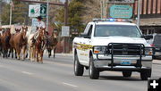 Police Escort. Photo by Debbee Miller.