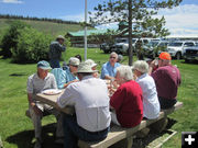 Enjoying the food. Photo by Bill Winney.