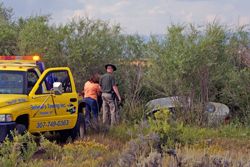 Car meets watery end on 191. Photo by Megan Rawlins, Pinedale Roundup\.