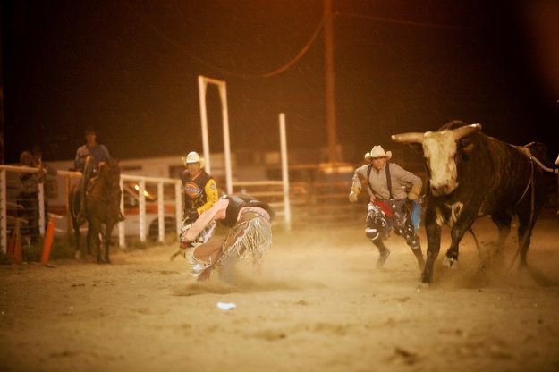 Clowns chase him off. Photo by Tara Bolgiano, Blushing Crow Photography.