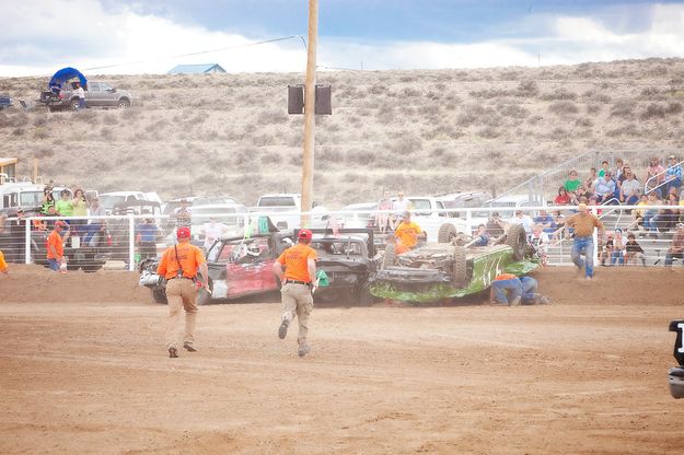 Help rushes in. Photo by Tara Bolgiano, Blushing Crow Photography.