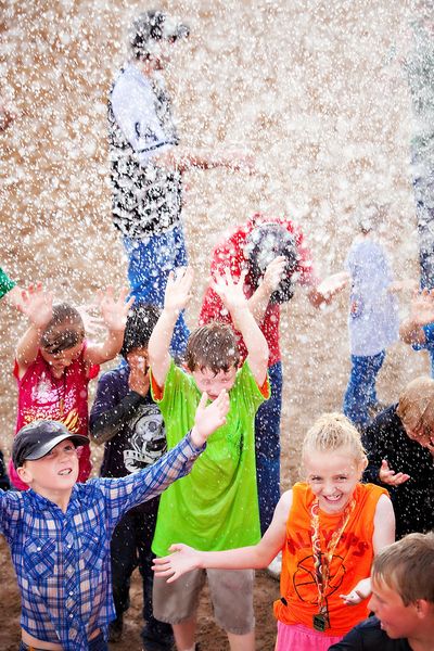 Getting wet. Photo by Tara Bolgiano, Blushing Crow Photography.