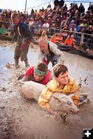 Pig Wrestling. Photo by Tara Bolgiano, Blushing Crow Photography.