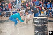 Hog Wrestling. Photo by Tara Bolgiano, Blushing Crow Photography.