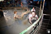 Everyone's in the mud. Photo by Tara Bolgiano, Blushing Crow Photography.