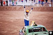 A wave to the crowd. Photo by Tara Bolgiano, Blushing Crow Photography.