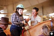 Hold the reins. Photo by Tara Bolgiano, Blushing Crow Photography.