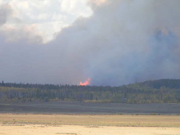 Flames in the distance. Photo by Mellisa Watson.