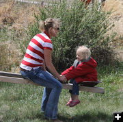 On the teetertotter. Photo by Cliint Gilchrist, Pinedale Online.