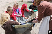 Washing laundry. Photo by Dawn Ballou, Pinedale Online.