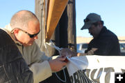 Quick repairs. Photo by Dawn Ballou, Pinedale Online.