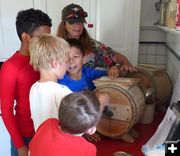 Churning butter. Photo by Clint Gilchrist.