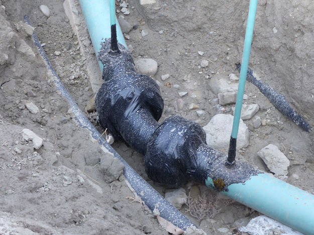 Repaired pipe. Photo by Dawn Ballou, Pinedale Online.